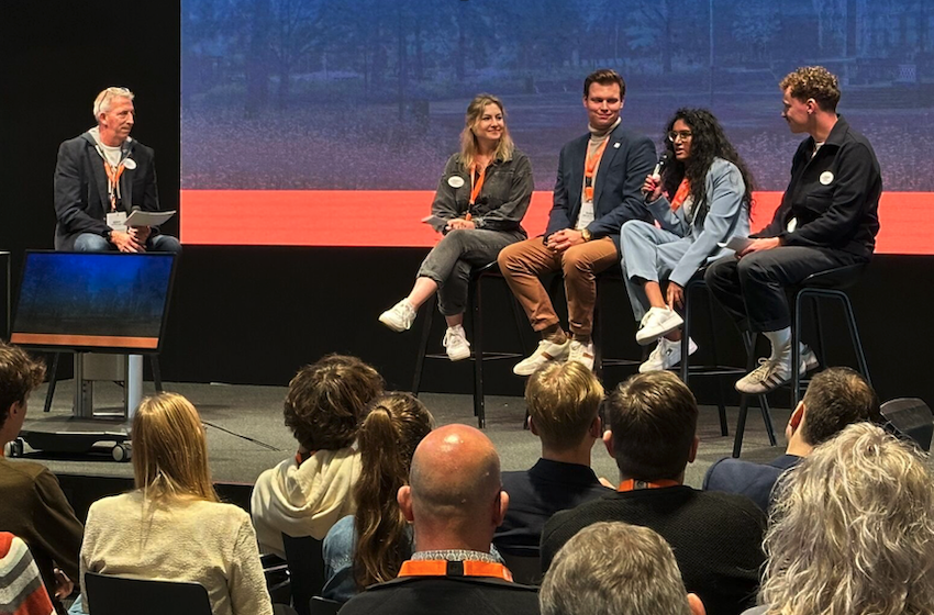 Björn, left, moderating a panel discussion at TEA Talks! in Holland